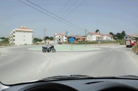 Motorcyclist circulating in a roundabout